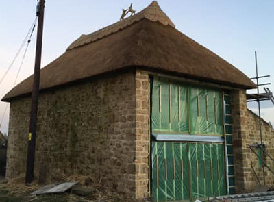 RJ Matravers Thatched building